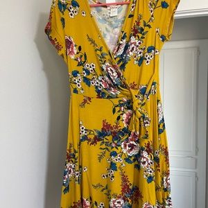 Above knee yellow floral wrap top dress